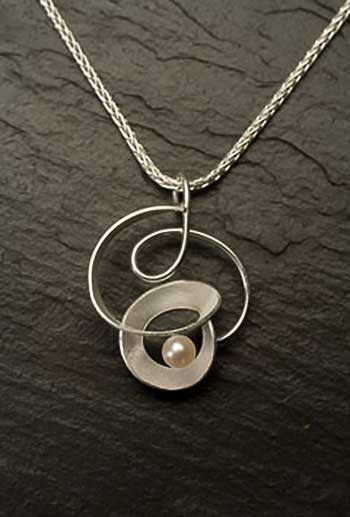 Sterling-Silver-and-Pearl-Knot-Necklace.jpg